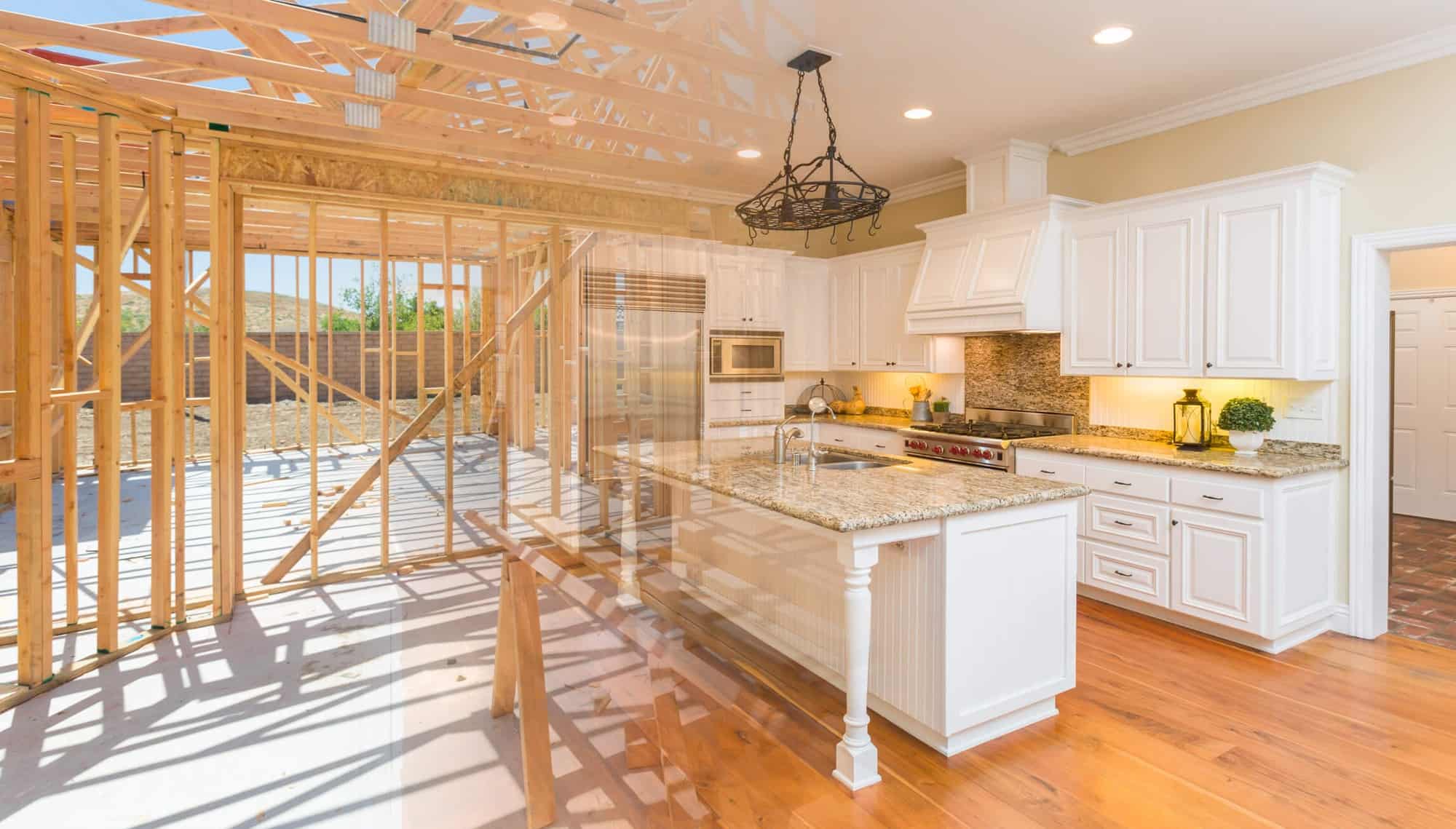 image of a kitchen transposed with the wood framing of an additional room attached to the kitchen representing a home addition