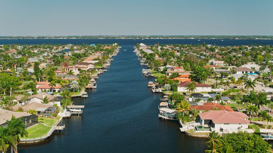 Aerial View of Houses Along Canal in Cape Coral, Florida